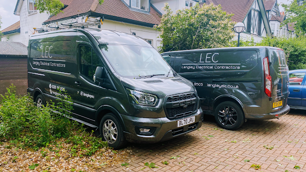 Two grey Langley Electrical Contractors vans with LEC branding